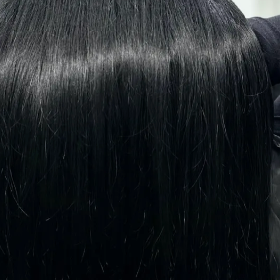 “Jet Black hair extensions, real human hair, hand-tied and clip-in wefts for intense black color, natural-looking volume, long-lasting length, thick and full hair, seamless blending, salon-quality premium extensions, tangle-free, soft, smooth, shiny, professional-grade hair extensions.